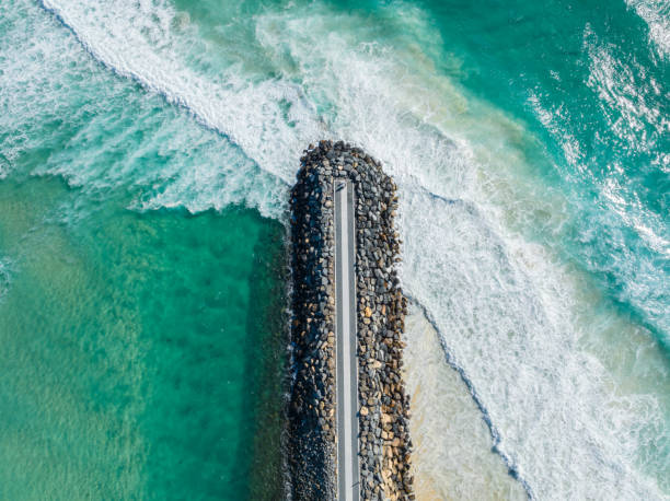 istock Aerial view of ocean break wall 1800897564