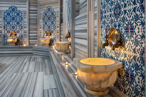 Authentic Turkish bath, marble kurnas and cladding, brass faucets.