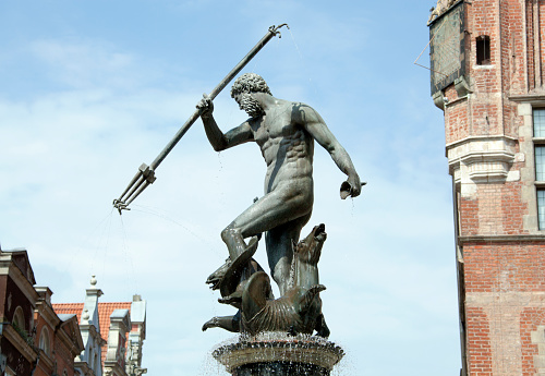 The close view of 17th century Neptune's fountain top part in Gdansk old town (Poland).