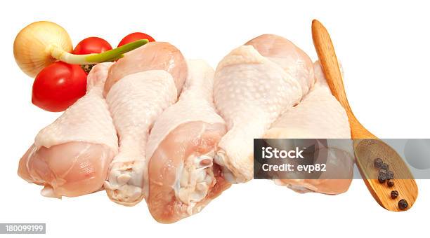 Raw Chicken Legs With Vegetables Isolated On White Background Stock Photo - Download Image Now