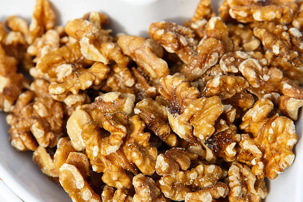 istock Walnuts in white bowl as healthy snack 180100008