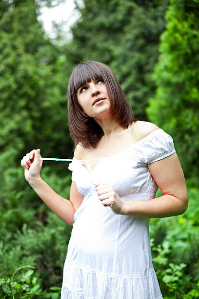 istock young woman in a forest 180100205