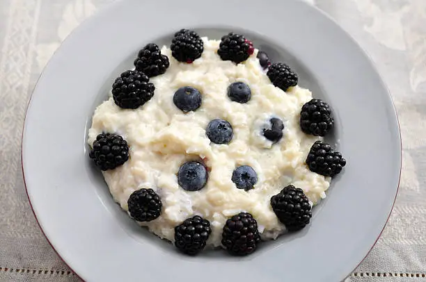 Milk Rice with blueberries and blackberries