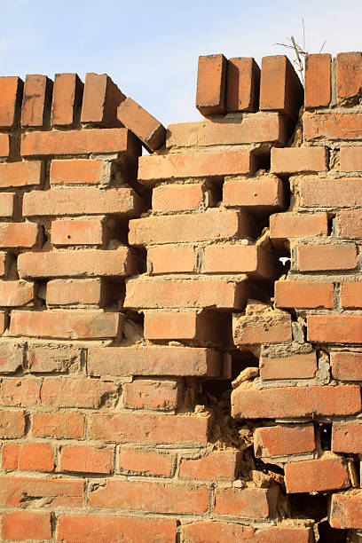istock crack of red brick wall 180102364