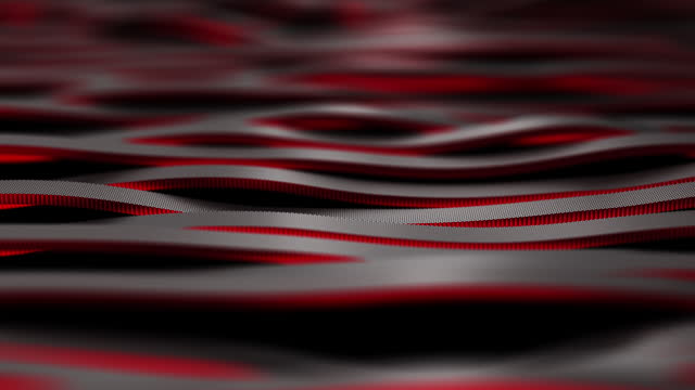 Seamless loop. Black carbon fiber motion background. Technology wavy line with red neon glowing light 3d illustration.