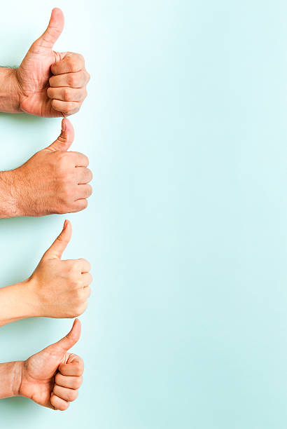 Four hands meaning motivation winning success team, voting recommend
