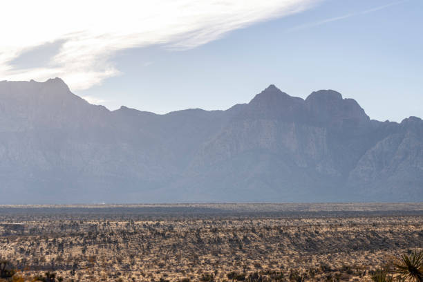 istock silhouette of mountain and desert 1801029233