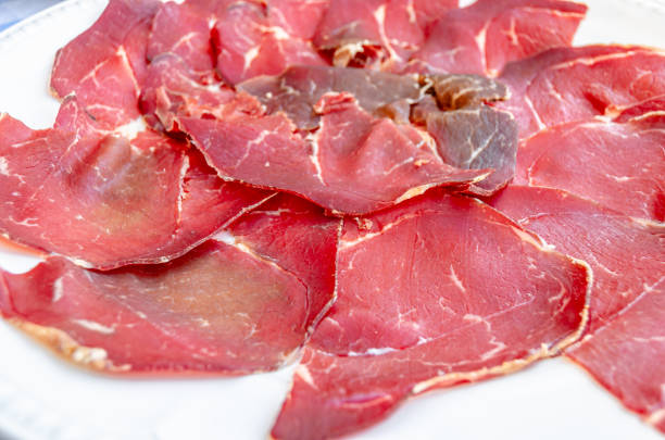 salted chunks of red meat on plate