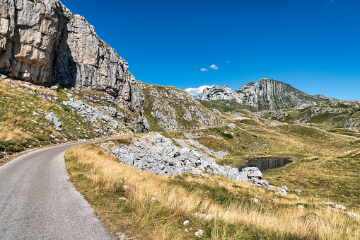 Stelvio mountain pass or Stilfser Joch scenic road serpentines panoramic view, border of Italy and Switzerland