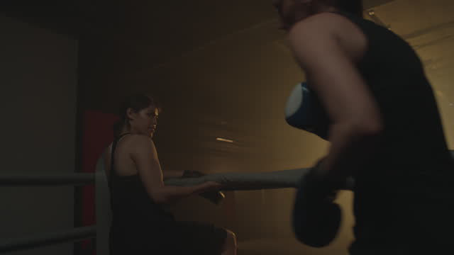 Woman Going to Boxing Ring while Training before Competition