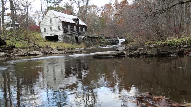 abandoned historic mill on stream (grain milling stone, water mill wheel) scenic rustic country building landmark (griding) rest plaus marbletown waterfall (still, pan up, down) footage