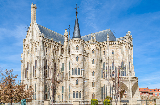 Astorga, Spain - March 9, 2014: View of the neo-Gothic building of the Episcopal Palace of Astorga, Castile and Leon, Spain. It was designed by the modernist architect Antoni Gaudi, built between 1889 and 1915