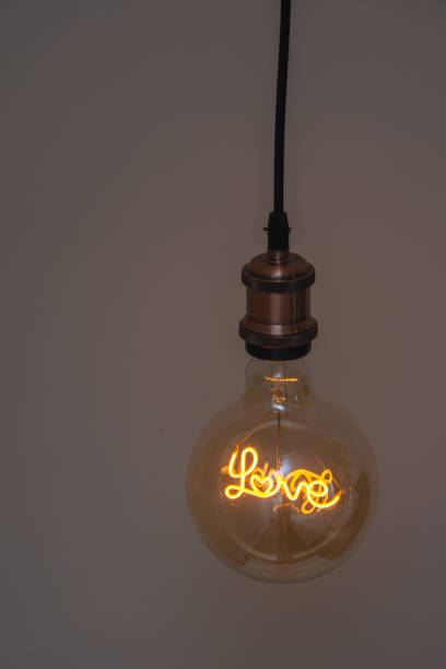 istock Modern chandelier Glowing light bulb filament 1801064791