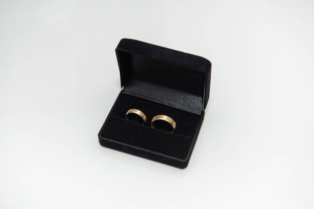 istock Gold Engagement-Wedding Ring Set in a black box 1801067939