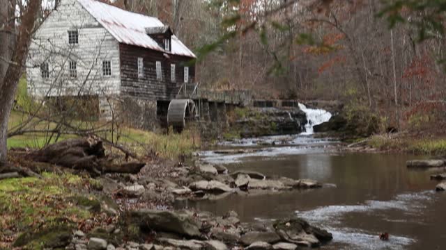 abandoned historic mill on stream (grain milling stone, water mill wheel) scenic rustic country building landmark (griding) rest plaus marbletown waterfall (still, pan up, down) footage