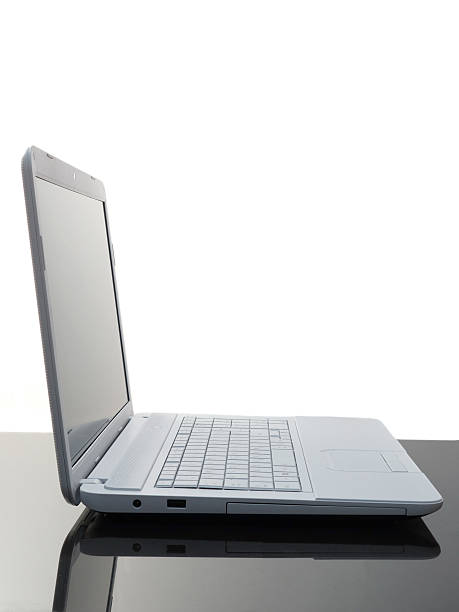 istock laptop on black desk 180108591