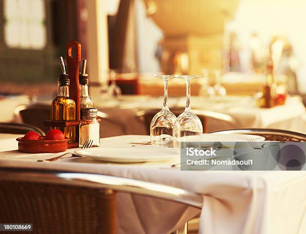 Restaurant Table At Sunset Stock Photo - Download Image Now - Restaurant, Table, Summer