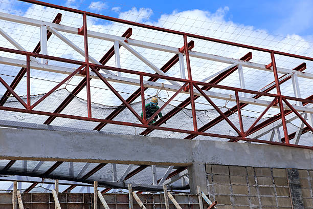 istock labor working in construction site  for roof prepare 180111514