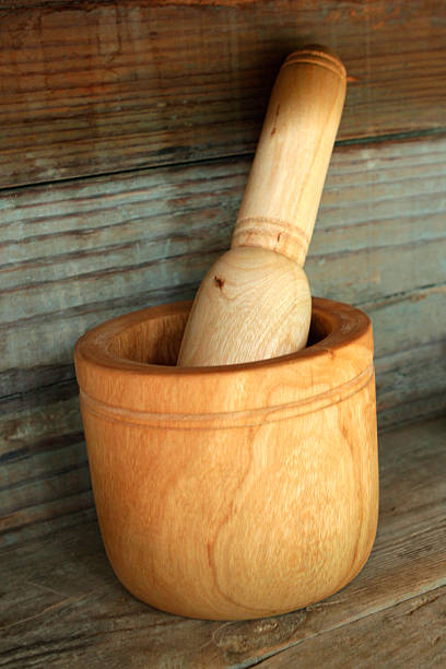 istock Wooden mortar and pestle 180113784