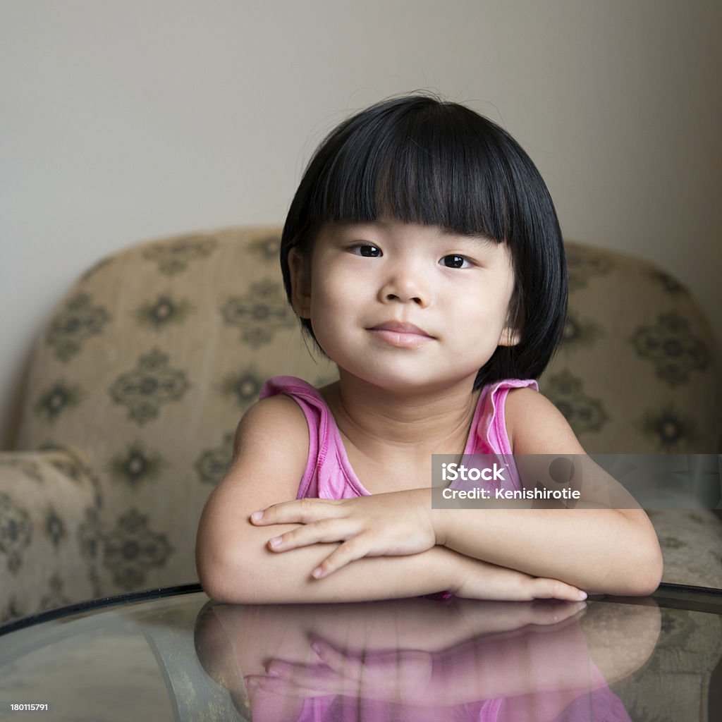 Little Asian girl Portrait of the little Asian child indoor Asian and Indian Ethnicities Stock Photo