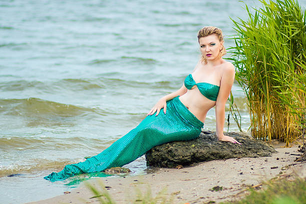 istock Young woman mermaid 180116470