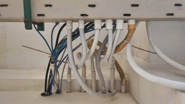 istock Cable connection on the offices ceiling to give internet connection and power supply 1801178735
