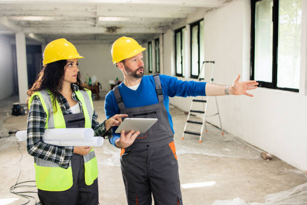 istock Young couple is renovating their apartment 1801203141