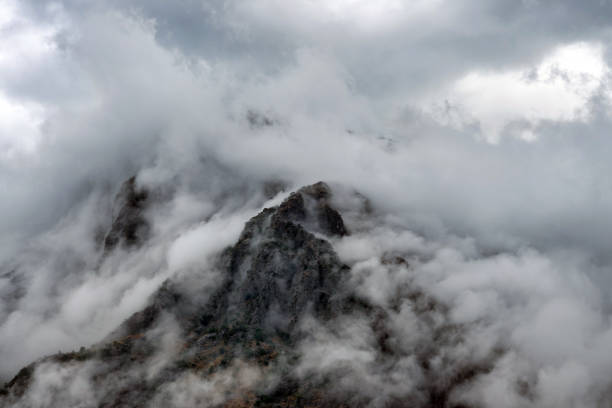 istock Heavy cloud fog in mountains 1801229211