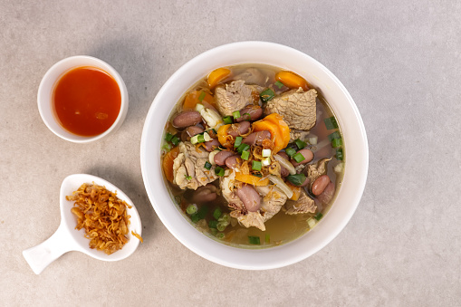 Sup Kacang Merah or Red Bean Beef Soup is Clear Soup with Red Bean, Beef Slices and Vegetables.