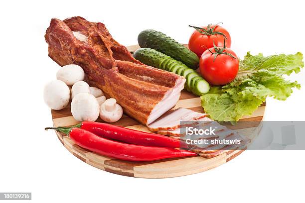 Sausage On Plate With Vegetables Stock Photo - Download Image Now - Baked, Cooked, Dining