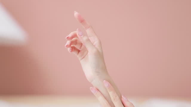 asian female skincare hand