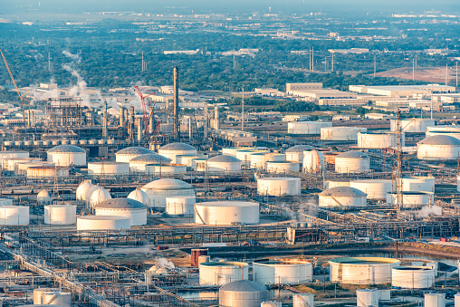 A fuel storage tank yard of an oil refinery in Houston, Texas located along the Ship Channel about 5 miles east of downtown shot via helicopter from an altitude of about 600 feet.