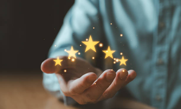 istock Entrepreneur give five star for customer satisfaction feedback for best service quality that need meet expectation or standard of the service. Good experience feedback for goods and service 1801414924