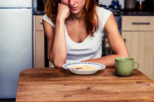 istock Young woman hates cereal 180143501