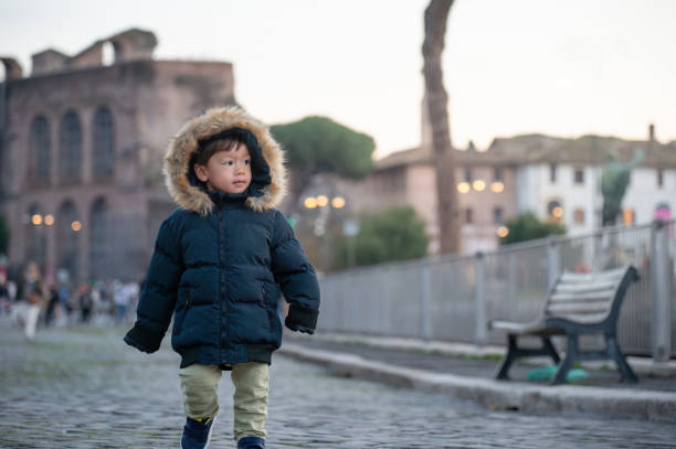 istock Little boy at downtown Rome 1801445091