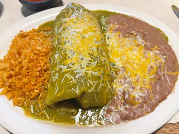 istock Large Burrito with Green Sauce and Melted Cheese 1801498852