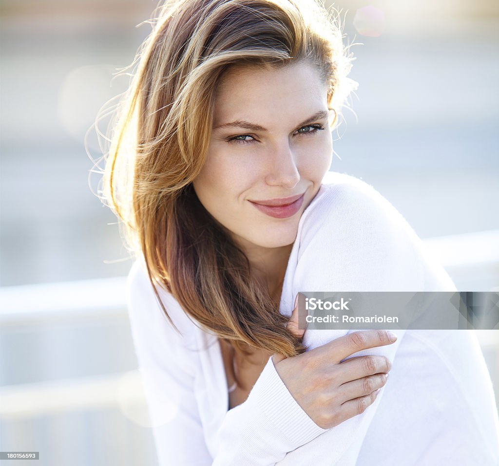 Hot Girls Wearing Sweaters hilarious brunette smiling girl wearing white sweater Women Stock Photo