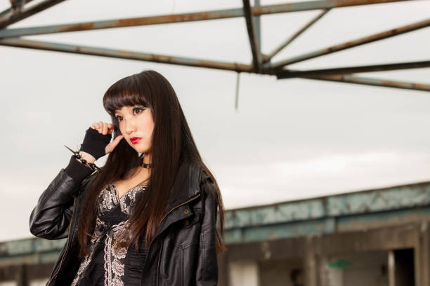 Goth lady of 30 photographed in a studio.