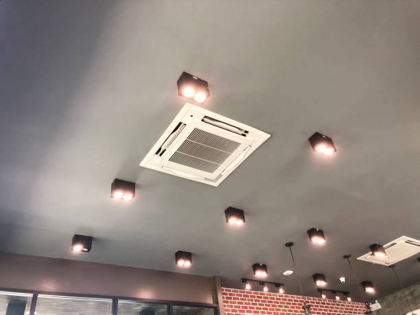 istock Modern ceiling mounted cassette type air conditioning system in coffee shop 1801611978