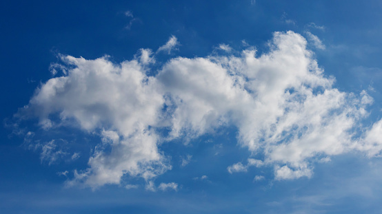 Blue sky background with tiny clouds. Cloudscape - Blue sky and white clouds. Clouds with blue sky