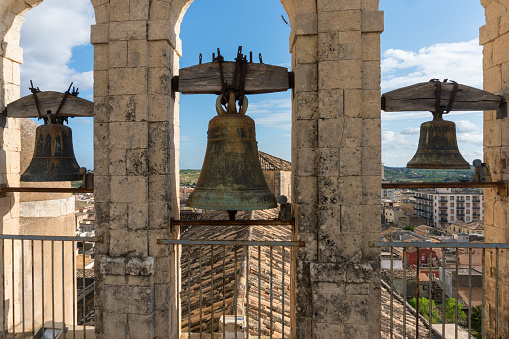 Noto,Italy-May 8, 2022:View of the bells on the terrace of the church of Santa Chiara during a sunny day