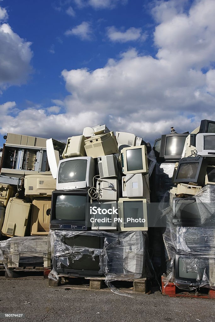 Modern waste of 80´s and 90´s Modern electronic waste for recycling or safe disposal, any logos and brand names have been removed. Great for recycle and environmental themes. Group Of Objects Stock Photo