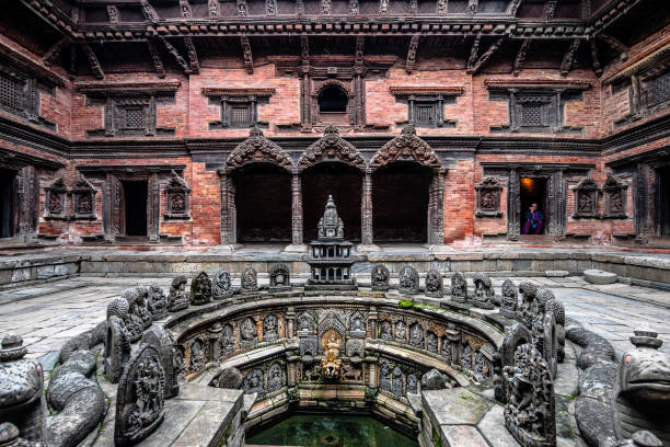 kathmandu, nepal. august 25th, 2023: tusha hiti is an amazing artwork made of carving stone