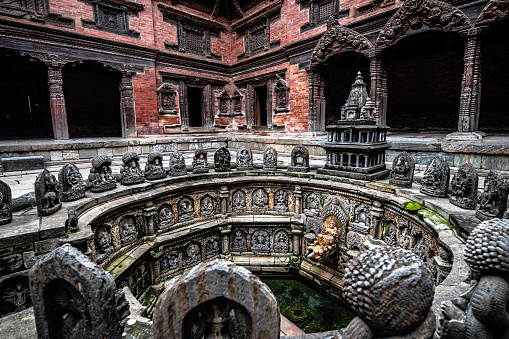 kathmandu, nepal. august 25th, 2023: tusha hiti is an amazing artwork made of carving stone