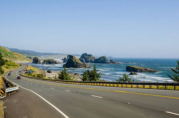 Photo of A winding coastal road on a clear day