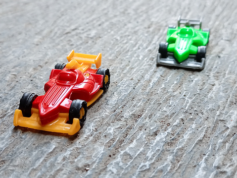 Green racing car toy.