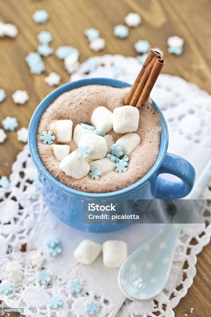Hot chocolate with little cakes Hot chocolate with marshmallows and little sugar stars Advent Stock Photo