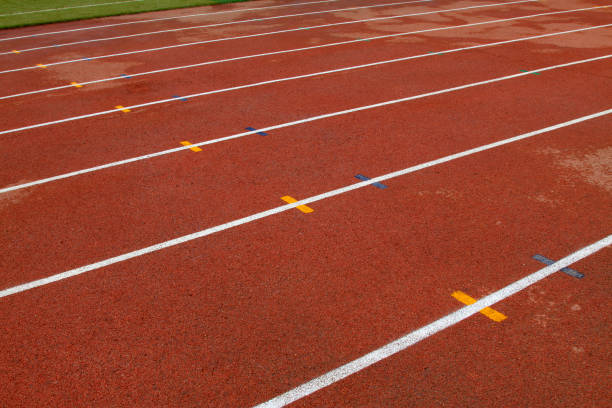 istock wet red plastic runway in a sports ground 1801794391