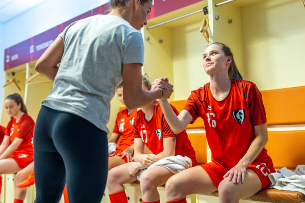 istock Soccer coach shaking hands with player 1801794412