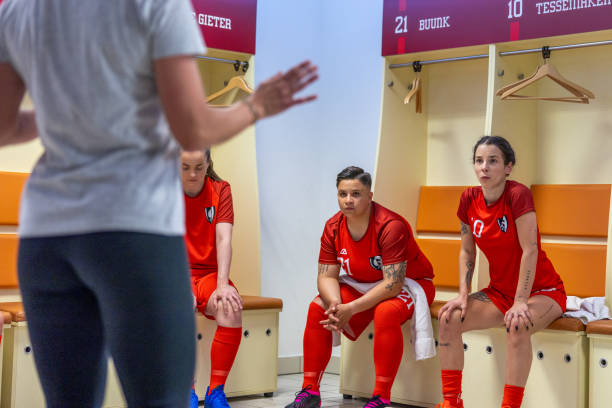 istock Soccer trainer motivating women players 1801794939